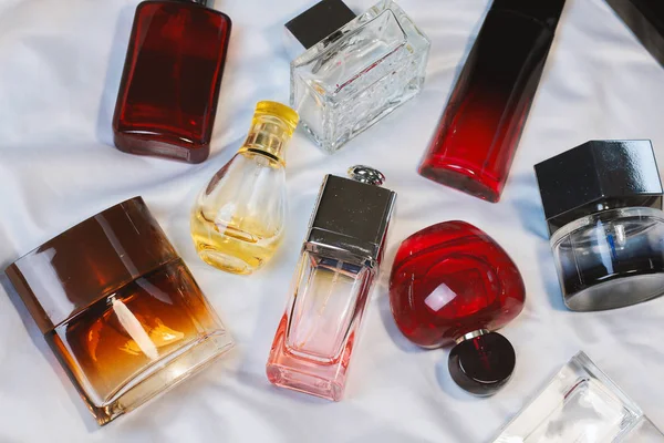 Colorful Fashion Trendy Bottles Perfume Toilet Water Fragrances Lie Silver — Stock Photo, Image