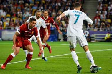 Kiev, Ukrayna - 26 Mayıs 2018: Cristiano Ronaldo ve Dejan Lovren (L) 2018 sırasında Uefa Şampiyonlar Ligi Finali maç Real Madrid ve Ukrayna Milli Güvenlik olimpiyskiy Stadyumu'nda Liverpool arasında