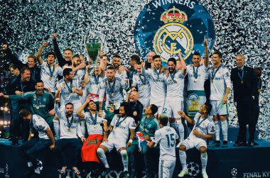 KYIV, UKRAINE - MAY 26, 2018: Footballers of Real Madrid celebrate the victory in the final of the UEFA Champions League 2018 in Kiev  match between Real Madrid and Liverpool, Ukraine clipart