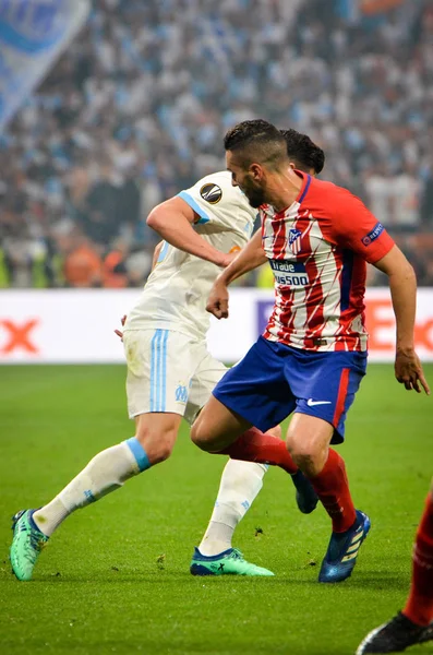 Lyon, Fransa - 16 Mayıs, 2018: Florian Thauvin arada Atletico Madrid vs Olimpik Marsilya Groupama Stadyumu, Fransa final Uefa Avrupa Ligi maçı sırasında karşı Koke