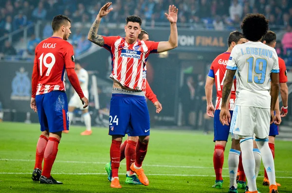 Lyon, Fransa - 16 Mayıs, 2018: Jose Gimenez (C) ve Luiz Gustavo sırasında final Uefa Avrupa Ligi maç arada Atletico Madrid vs Olimpik Marsilya Groupama Stadyumu, Fransa