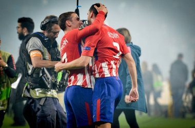 Lyon, Fransa - 16 Mayıs, 2018: Diego Godin ve Antoine Griezmann final Uefa Avrupa Ligi Groupama Stadyumu, Fransa Olimpik Marsilya karşı zafer kutluyor