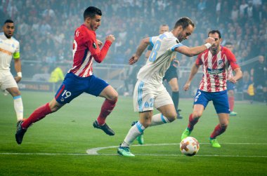 Lyon, Fransa - 16 Mayıs, 2018: Lucas Hernandez Valere Germain (R) arada Atletico Madrid vs Olimpik Marsilya, Fransa final Uefa Avrupa Ligi maçı sırasında karşı