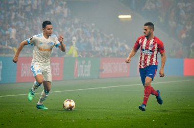 Lyon, Fransa - 16 Mayıs, 2018: Florian Thauvin Koke Atletico Madrid vs Groupama Stadyumu, Fransa Olimpik Marsilya arasında final Uefa Avrupa Ligi maçı sırasında karşı