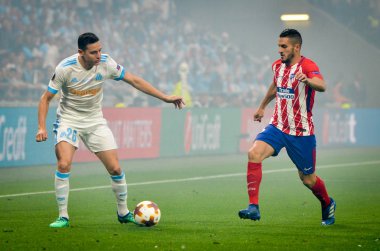 Lyon, Fransa - 16 Mayıs, 2018: Florian Thauvin Koke Atletico Madrid vs Groupama Stadyumu, Fransa Olimpik Marsilya arasında final Uefa Avrupa Ligi maçı sırasında karşı