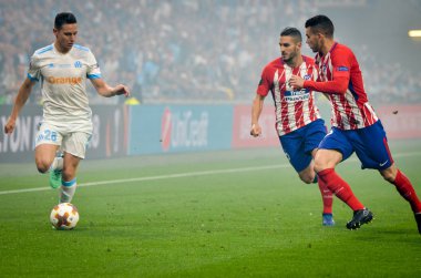 Lyon, Fransa - 16 Mayıs, 2018: Florian Thauvin Lucas Hernandez Atletico Madrid – Olimpik Marsilya, Fransa arasında final Uefa Avrupa Ligi maçı sırasında karşı