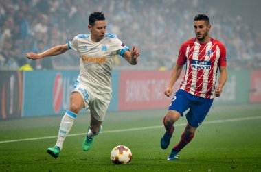 Lyon, Fransa - 16 Mayıs, 2018: Florian Thauvin Koke Atletico Madrid vs Groupama Stadyumu, Fransa Olimpik Marsilya arasında final Uefa Avrupa Ligi maçı sırasında karşı