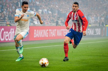 Lyon, Fransa - 16 Mayıs, 2018: Florian Thauvin Lucas Hernandez Atletico Madrid – Olimpik Marsilya, Fransa arasında final Uefa Avrupa Ligi maçı sırasında karşı