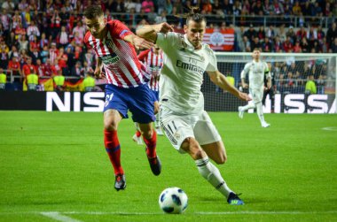 Tallinn, Estonya - 15 Ağustos, 2018: Gareth Bale son sırasında Lucas Hernandez (L) karşı 2018 Uefa Süper Kupası maç arada Atletico Madrid vs Real Madrid A. Le Coq Arena Stadyumu, Estonya