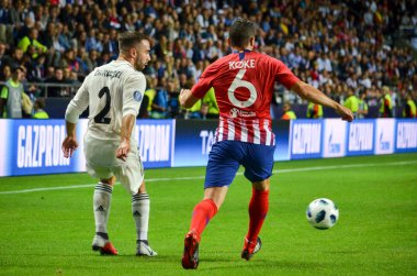 Tallinn, Estonya - 15 Ağustos, 2018: Koke (R) oyuncular final 2018 Uefa Süper Kupa sırasında maç arada Atletico Madrid vs Real Madrid A. Le Coq Arena Stadyumu, Estonya