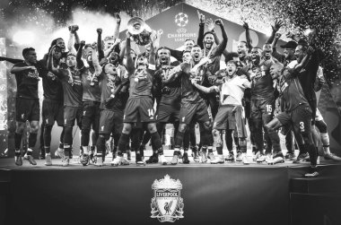 Madrid, Spain - 01 MAY 2019: Liverpool players celebrate their w clipart