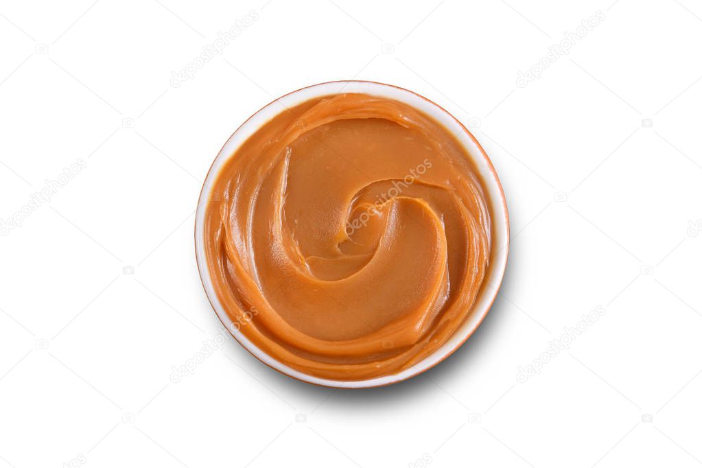 Dulce de leche bowl isolated on white