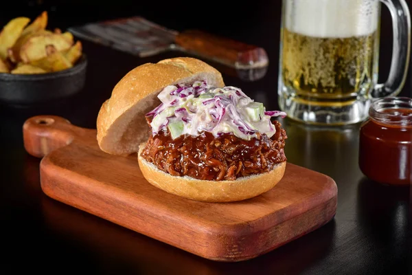 Pulled pork Sandwich on dark background