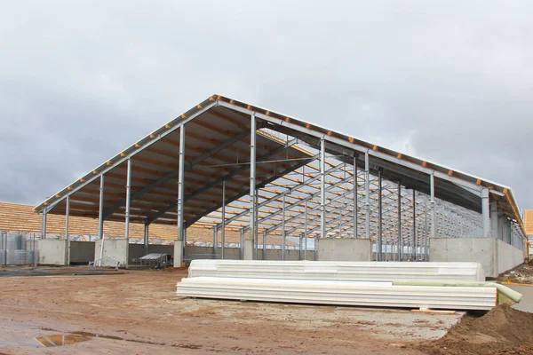 Sandwich panels at the construction site. Material for warming the walls of the building. Technologies in construction. An alternative to a brick building.