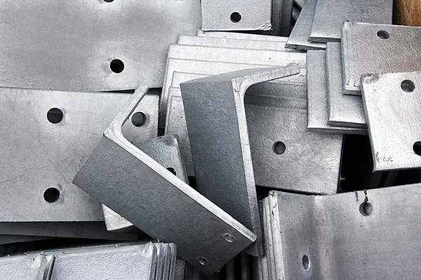 Metal parts for mounting structures with a galvanized coating. Metalworking with electroplating protects the metal from corrosion.