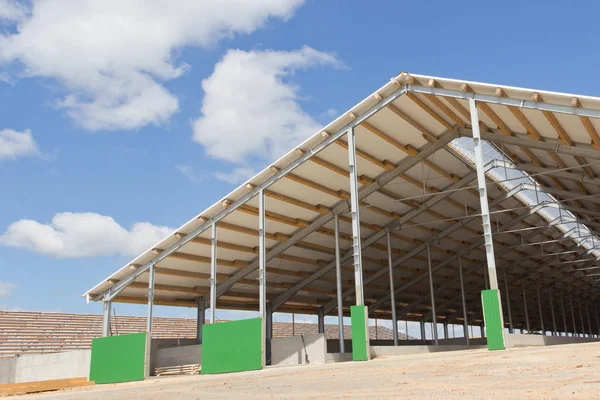 Sandwich panels on the metal frame. Material for warming the walls during construction. Technologies in construction. An alternative to a brick building.