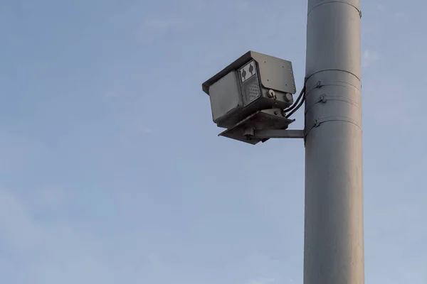 Traffic police speed radar on a pole in the city on the road