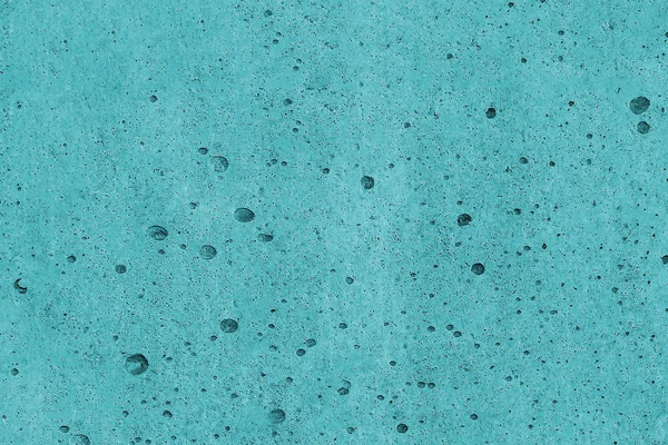 Turquoise textured background. Tinted concrete