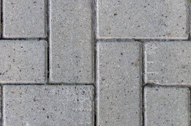 Kaldırımda gri kaldırım taşları. Yukarıdan görüntüle.