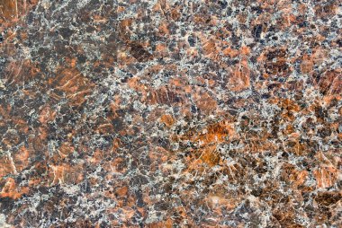 Güzel doku doğal cilalı granit taş. Resmin üzerine orada bir sürü çeşitli renk ölçekleri.