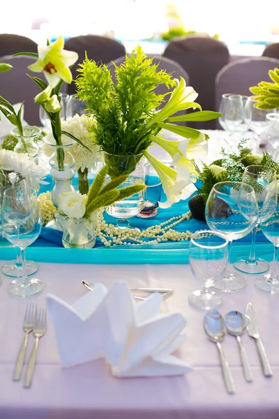 Dining table, Wedding table that decorated with flower arrangements and candles