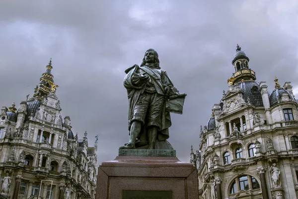 Statue of the David Teniers the Younger  in the city center of Antwerp,  Belgium.  Flemish painter(1610 -1690). The  attraction of Antwerp . Cloudy day .