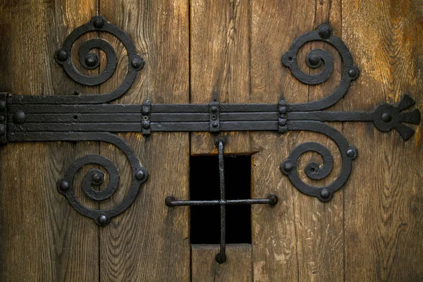 Fragment Old Wooden Door Metal Ornate Hinge Close — Stock Photo, Image