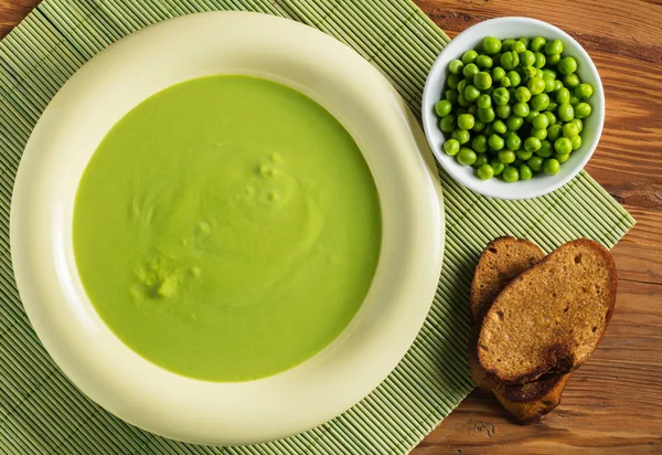 Puree Van Crème Soep Van Doperwtjes Houten Achtergrond — Stockfoto