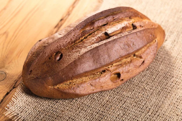 Close Van Het Brood Een Houten Achtergrond Rustieke Stijl — Stockfoto