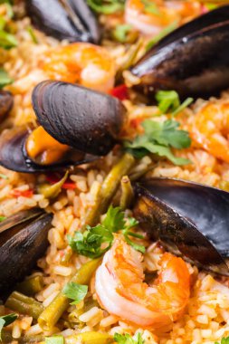 Gıda arka plan, paella deniz ürünleri ve sebze yakın çekim ile