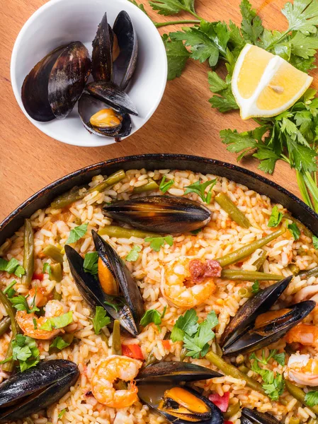 Spanish cuisine, paella with seafood and vegetables