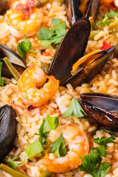 Gıda arka plan, paella deniz ürünleri ve sebze yakın çekim ile