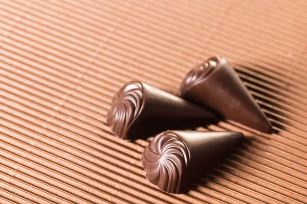 Chocolate Candy Close Brown Background — Stock Photo, Image