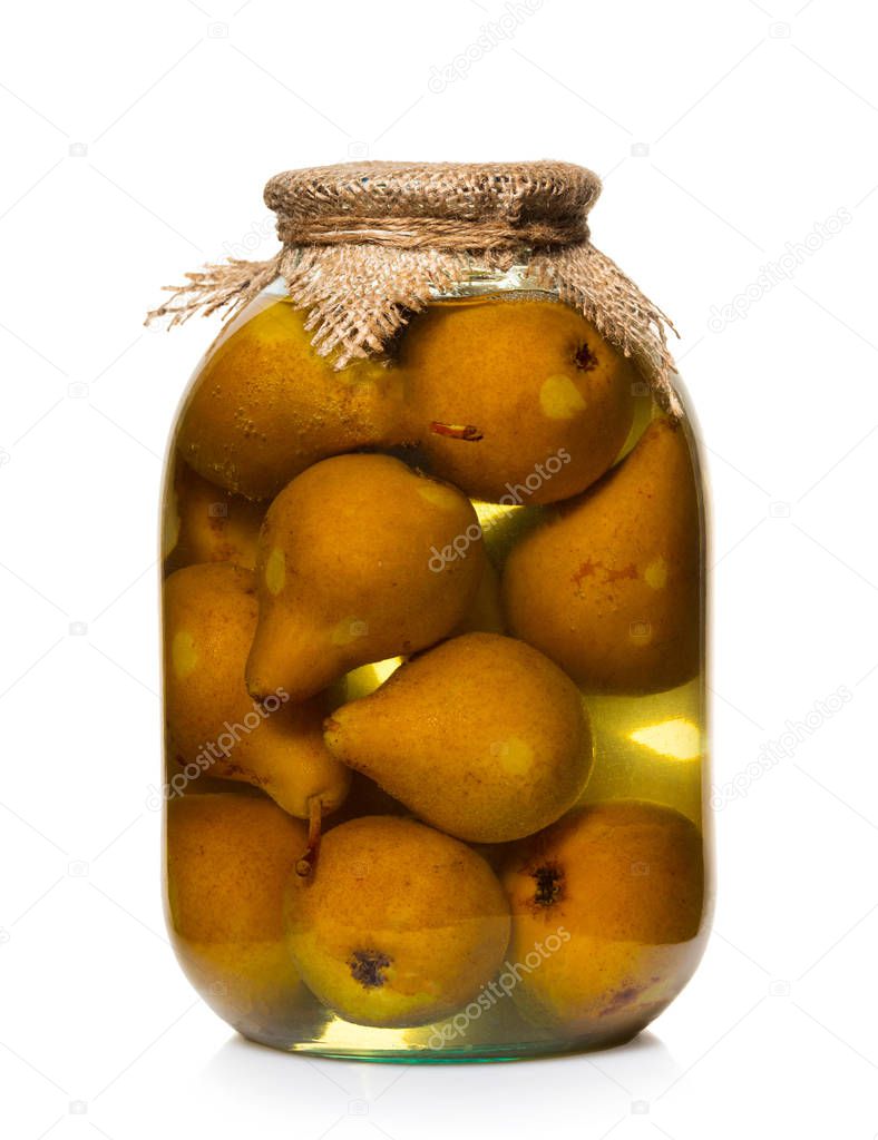 canned pears in a jar on white isolated background