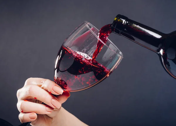 Red Wine Pouring Glass Black Background — Stock Photo, Image