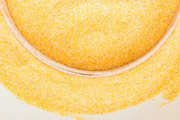 Above view of flour sieve on corn flour — Stock Photo, Image