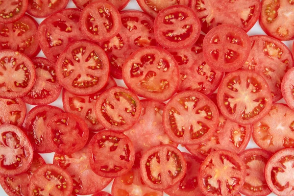 Healthy natural food, background. Tomatoes slices. Horizontal.