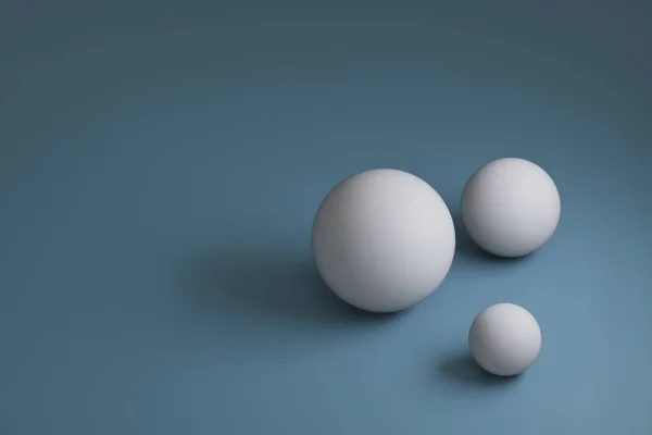 3D görüntüleme, mavi arkaplanda farklı boyutlarda üç beyaz küre, boşluğu kopyala