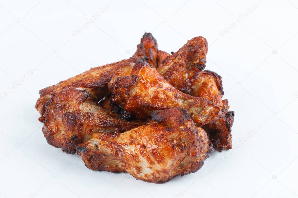 fried grilled chicken legs isolated on white background. menu. fastfood