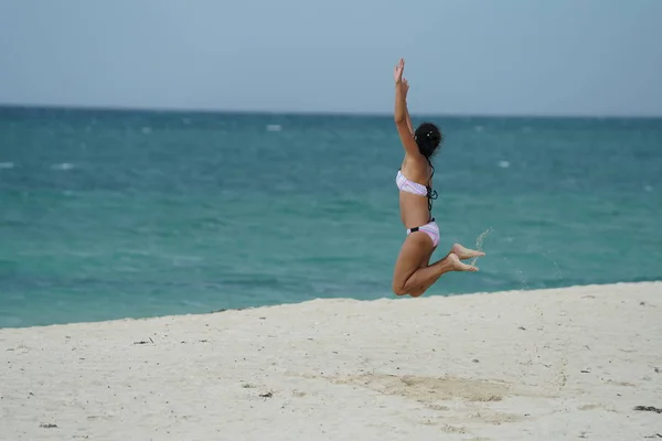 Rear View Woman Bikini Jumping Beach — Stock Photo, Image