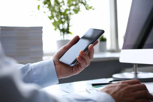 Businessman hipster holds telephone background