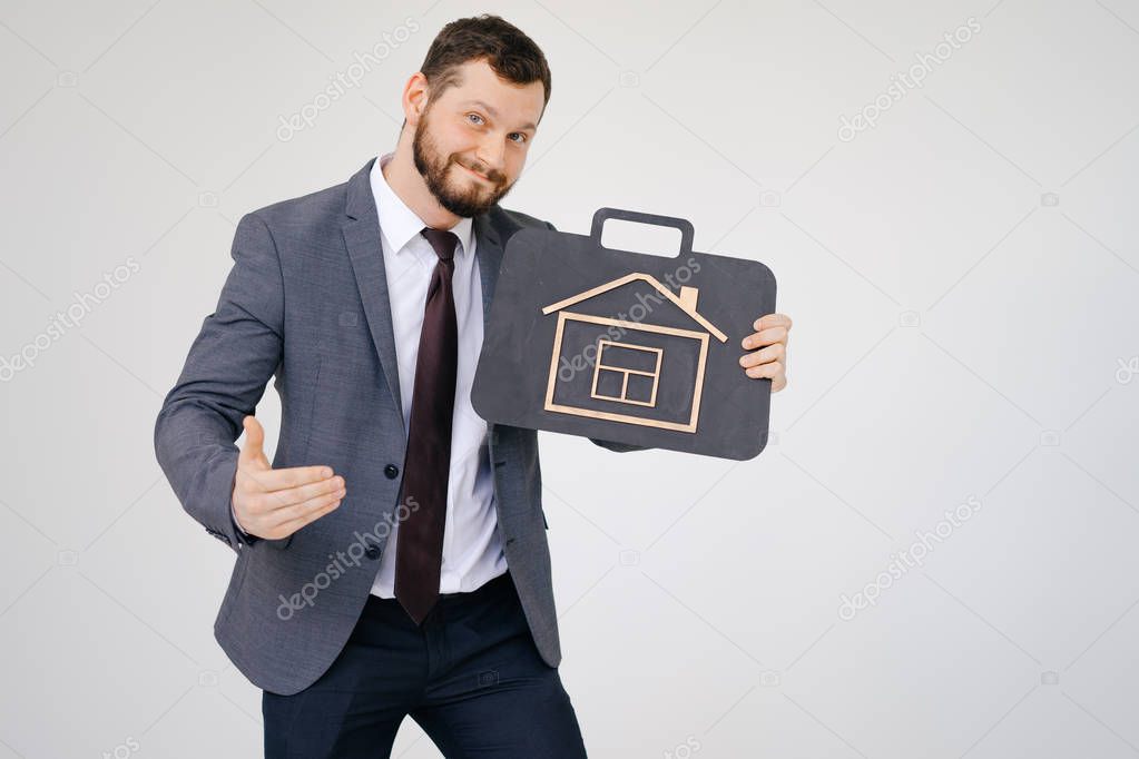 Businessman in suit portrait hold briefcase in hand