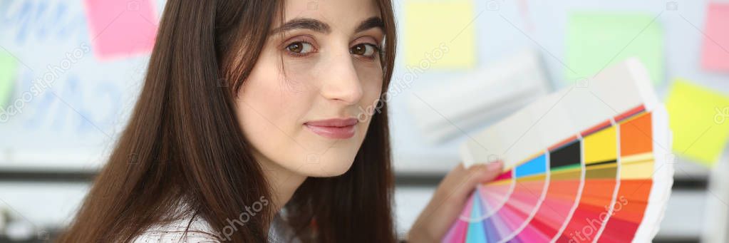 Beauty designer woman hold color palette in hand