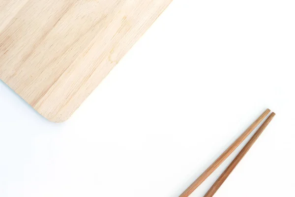 chopsticks cutting board wood on white background