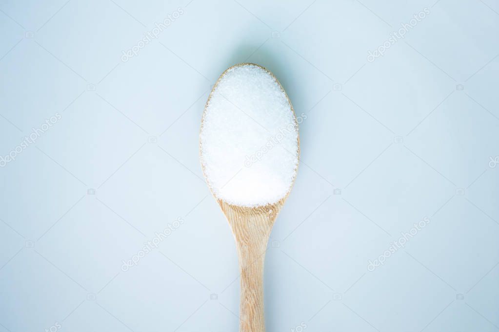salt white  food cooking on spoon and background