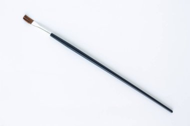 Beyaz arka plan üzerinde boya fırça ayarlama aracı sanat