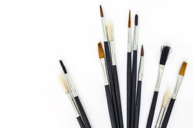 Beyaz arka plan üzerinde boya fırça ayarlama aracı sanat