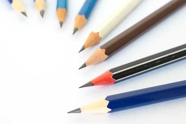pencil black, blue, brown tool art on white background