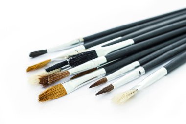 Beyaz arka plan üzerinde boya fırça ayarlama aracı sanat