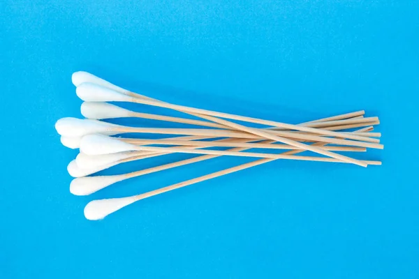 cotton bud, swab clean healthcare top view on blue background